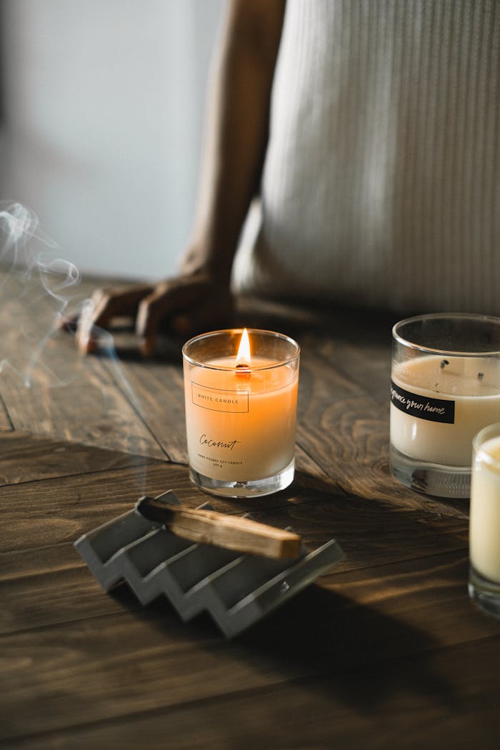 Warm and tranquil ambiance with lit candles and incense, perfect for relaxation.