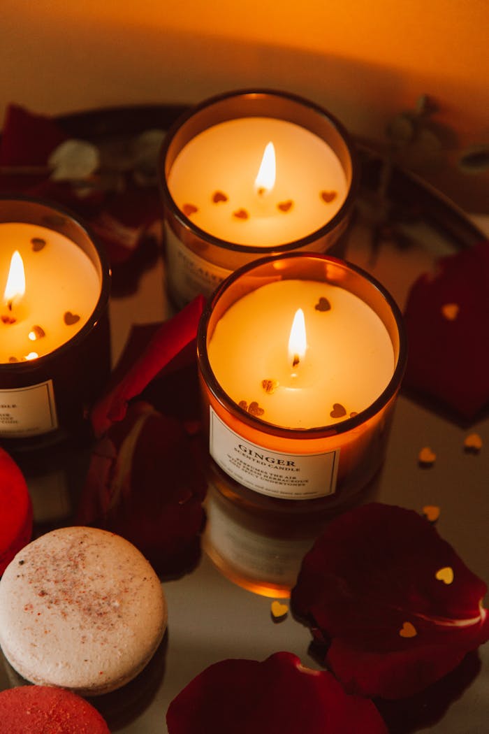 Warm candlelit scene with rose petals creating a cozy, romantic ambiance.